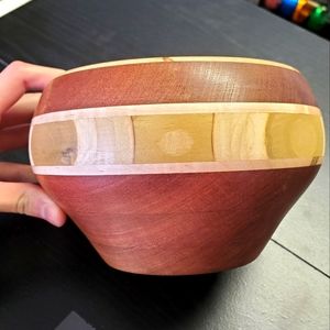 Handmade small wooden bowl made with mahogany and maple wood